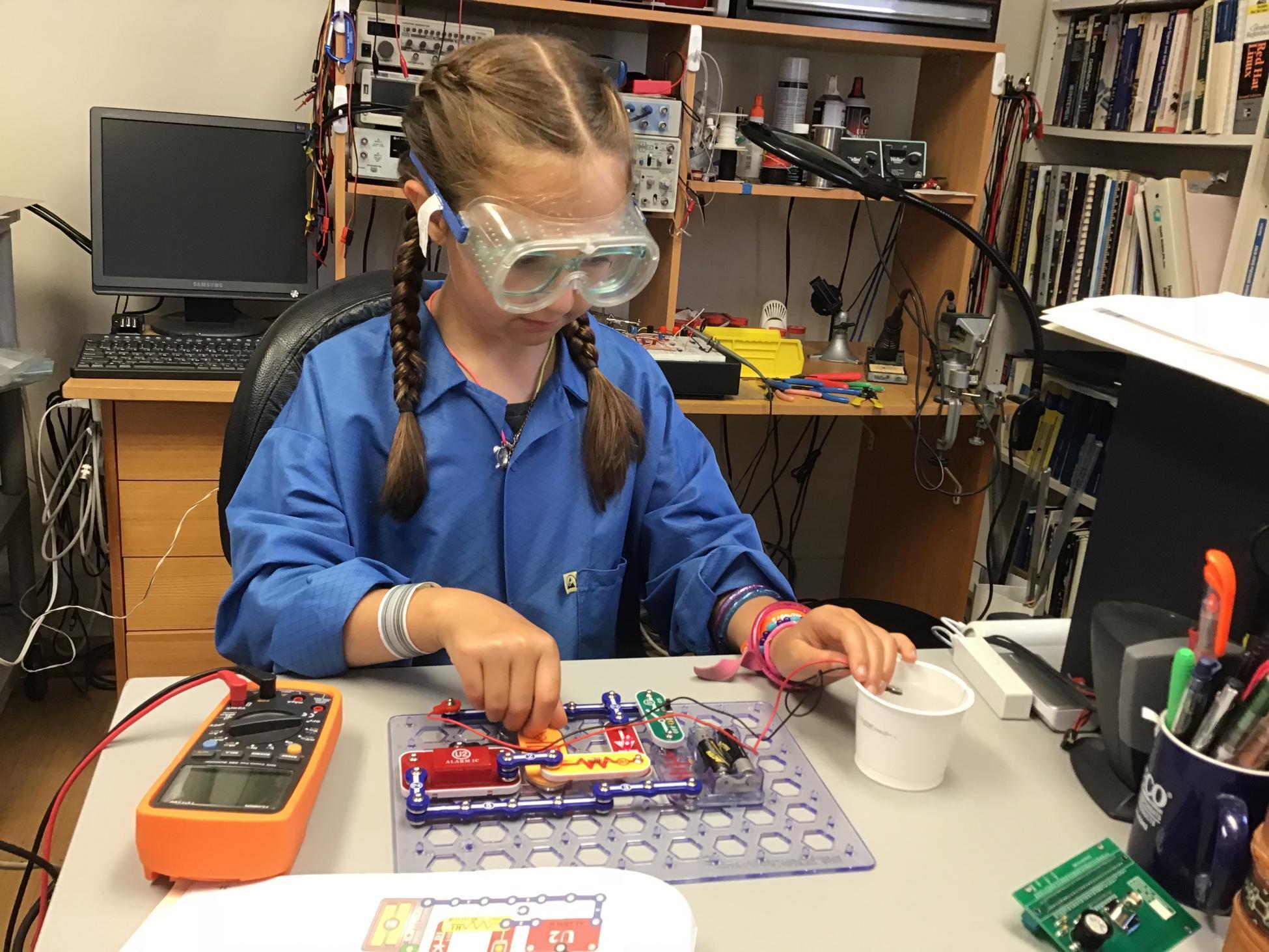 A young girl represents the next generation of science explorers the next generation of science explorers